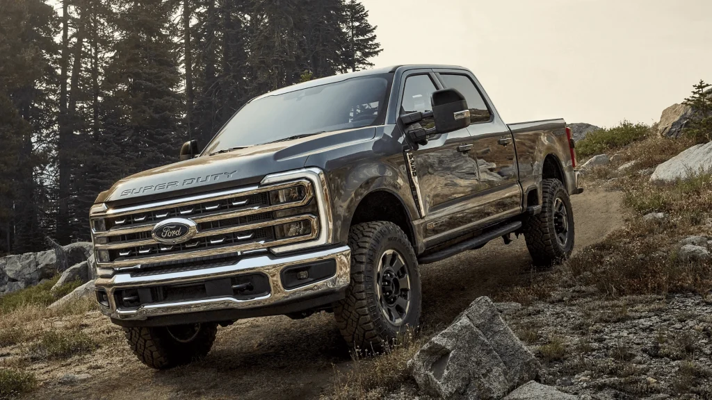 2025 Ford Super Duty pickup navigating a rugged trail, perfect for Cleveland farmers and tough terrain.