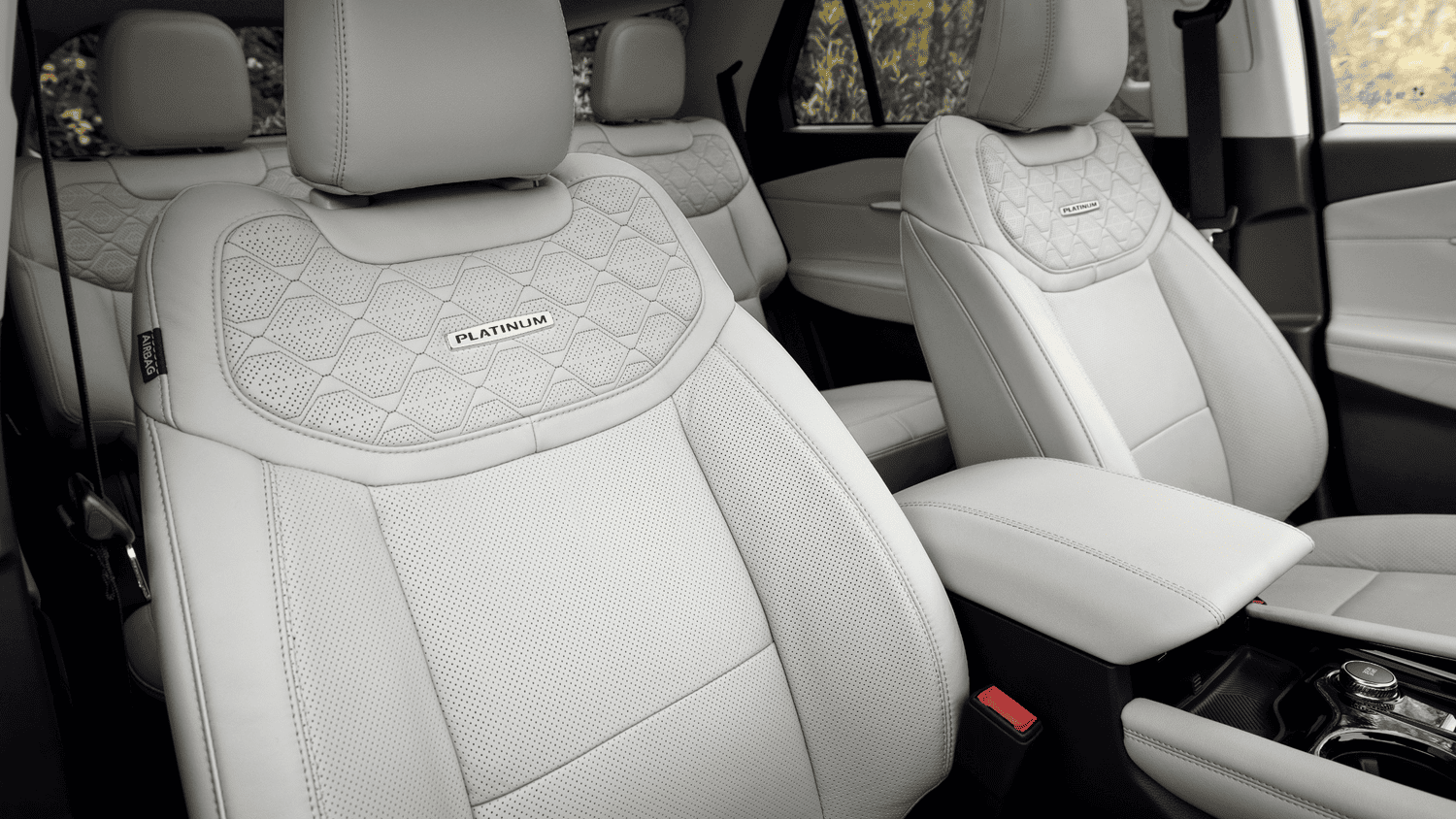 Front-row and second-row seats with Platinum badging in the 2025 Ford Explorer® in Euclid, OH, highlighting comfort and design.