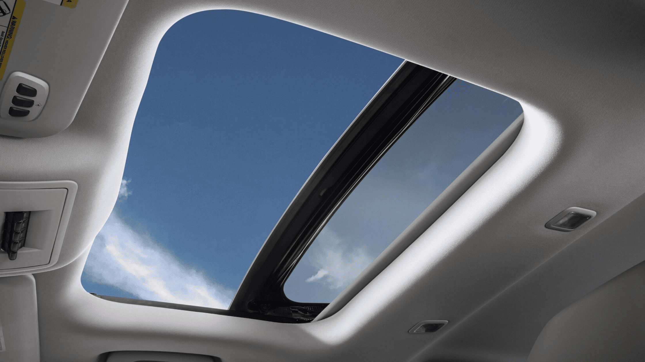 View of the sky through the sunroof of a 2025 Ford Bronco Sport parked in Cleveland, OH.
