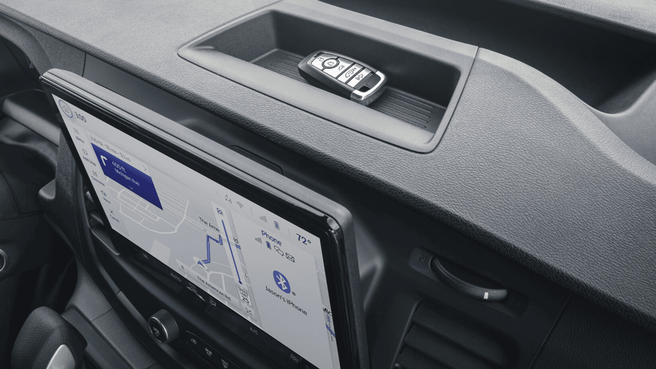 Dashboard of a 2025 Ford Transit® Van featuring a tablet and phone, showcasing modern technology in Cleveland, OH.