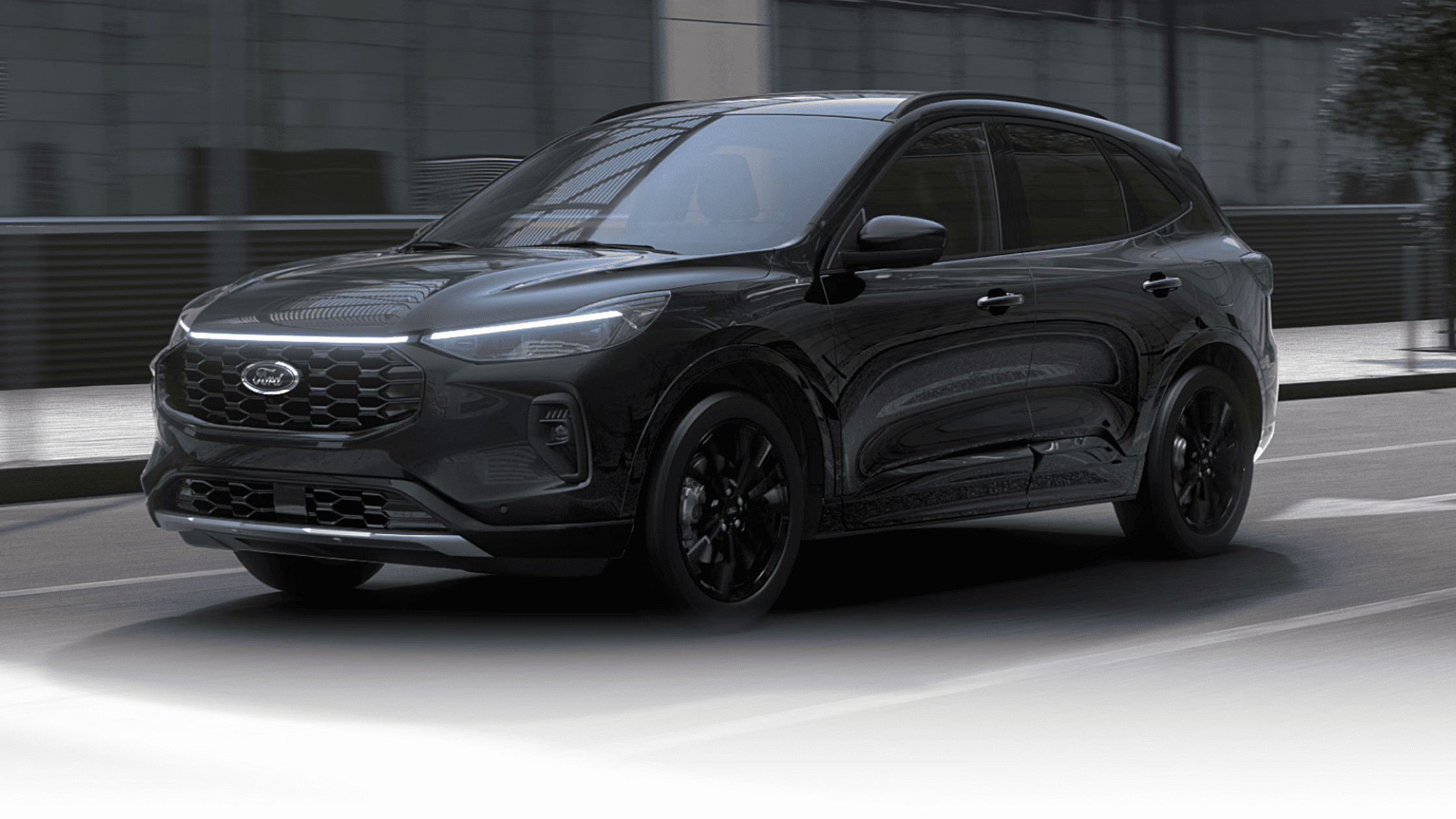 2025 Ford Escape ST-Line Hybrid driving through Cleveland, OH city streets