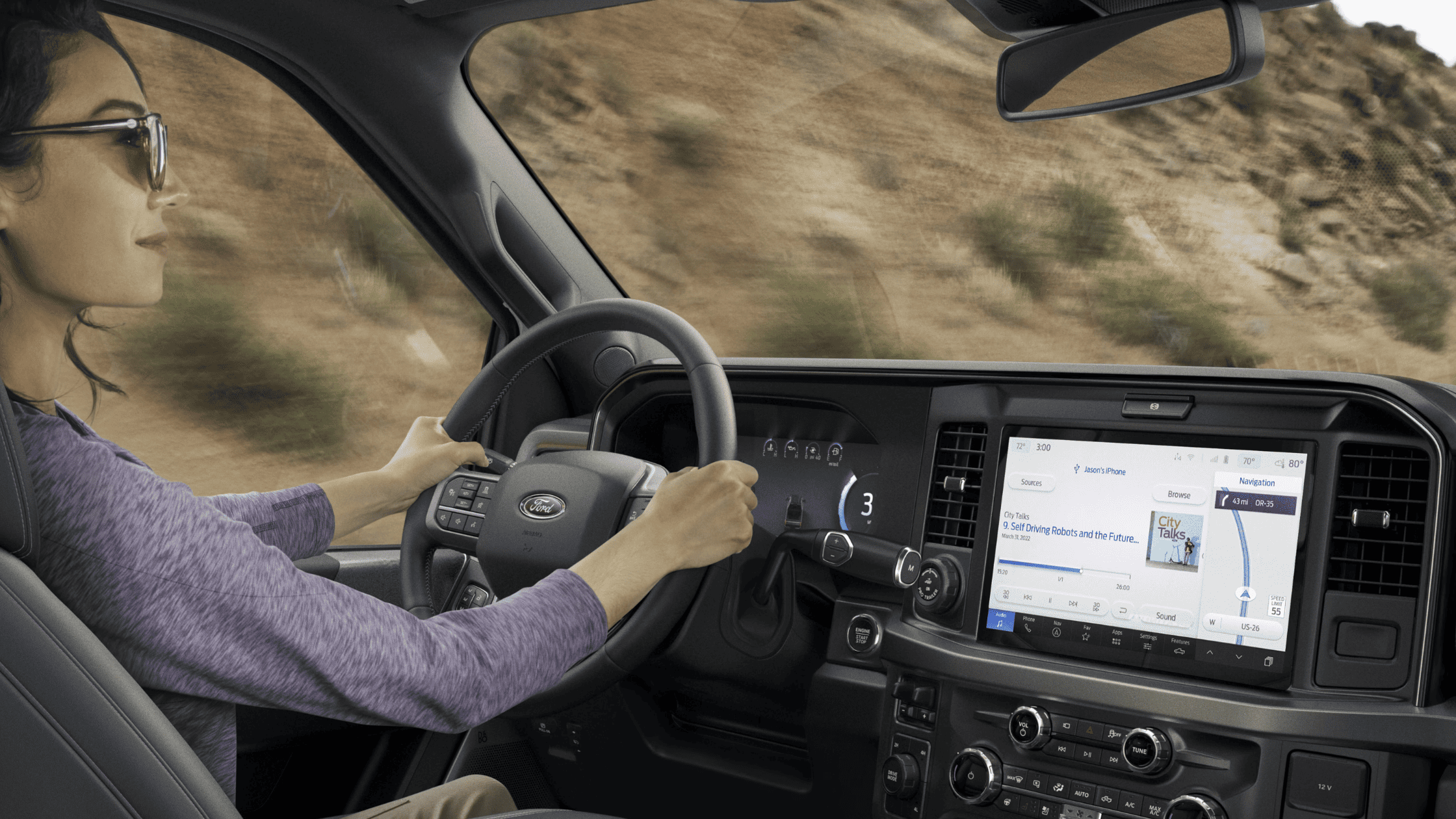 Woman driving 2025 Ford Super Duty with navigation and infotainment displayed in Cleveland, OH