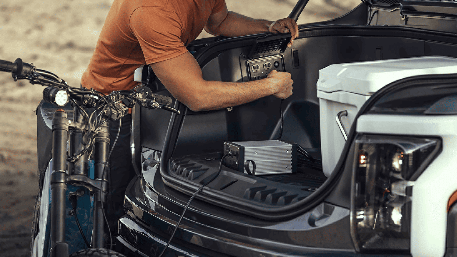 2024 Ford F-150® Lightning powering tools and devices through its frunk outlets near Euclid, OH, ideal for work and outdoor adventures.